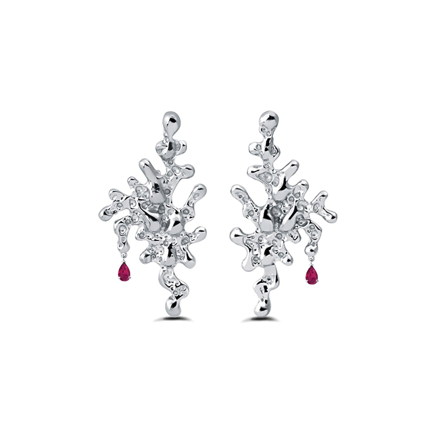 Silver earrings with red gemstones on a white background