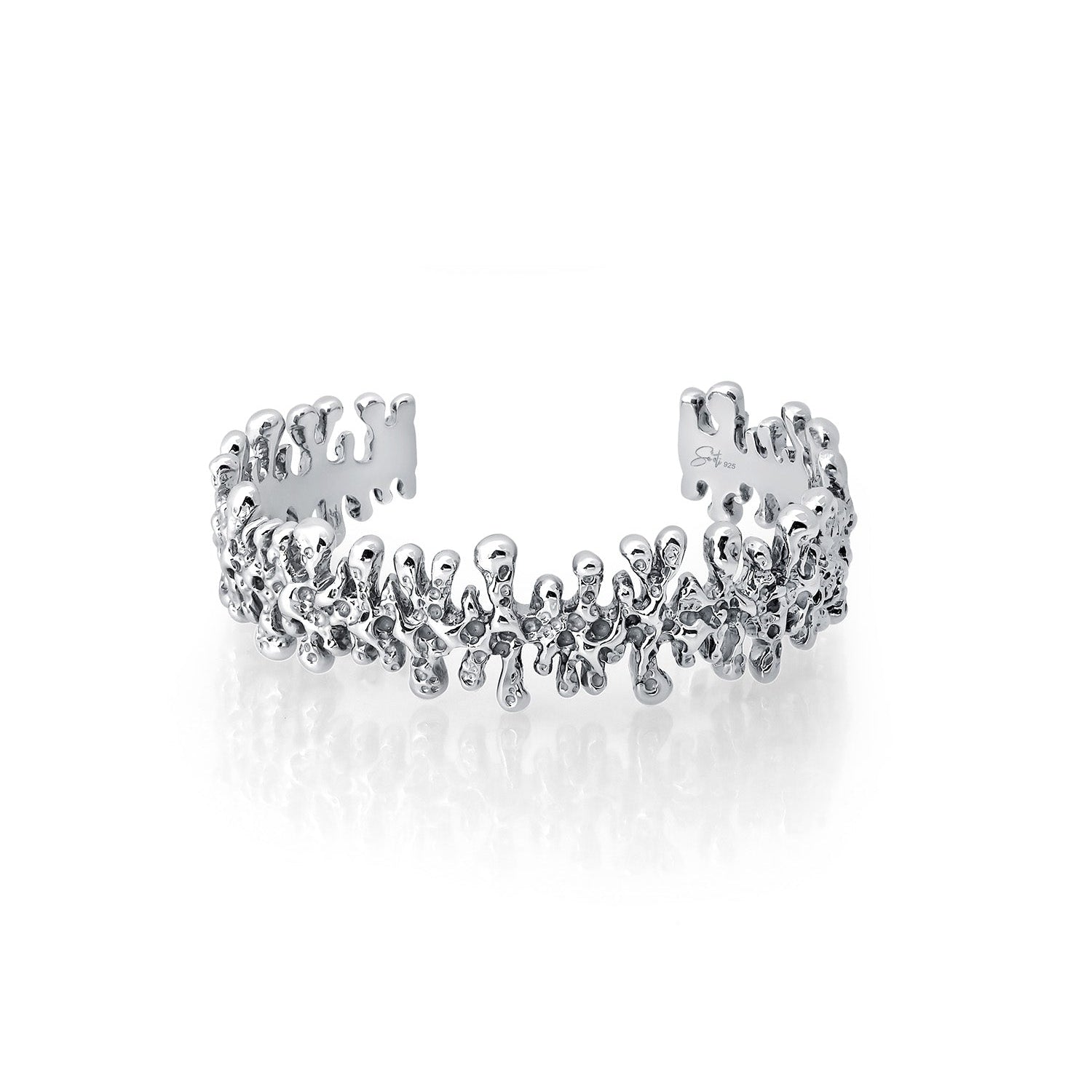 Silver bracelet with clear stones on a white background